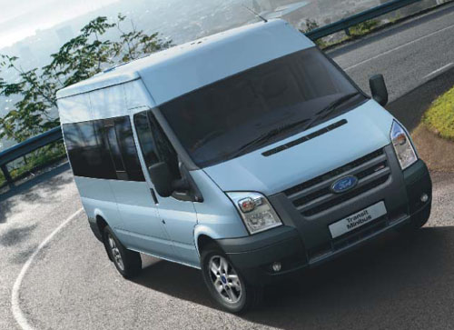 an image of a Ford Transit 14 seater with optional alloy wheels